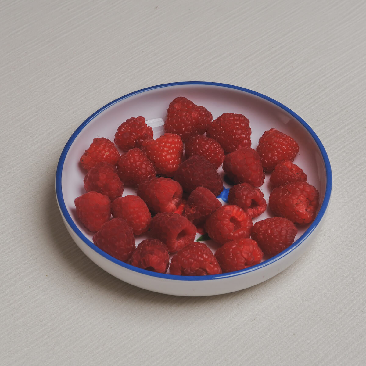 The berries Macro Bowl filled with raspberries.