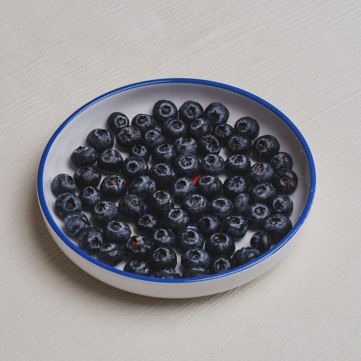 The berries Macro bowl filled with blueberries.