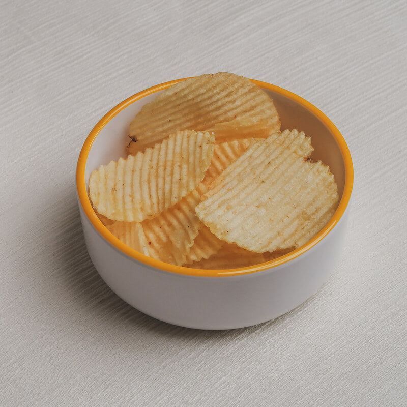 The chips Macro Bowl filled with potato chips.